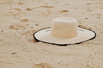 A straw hat on the sand .adriatic sea .summertime.travel italy