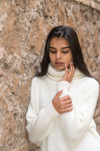 Portrait of a beautiful young woman in winter