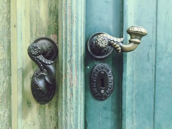 Close-up of latches on door