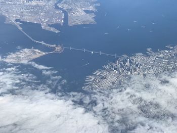 High angle view of sea against buildings in city