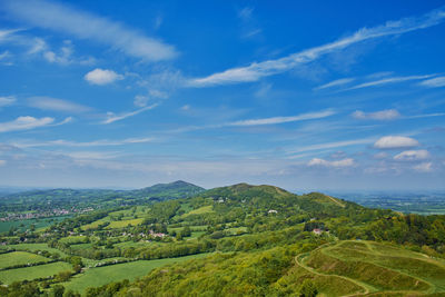 Scenic view of landscape against cloudy sky