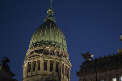 Low angle view of historic building against clear sky