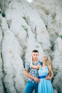 Young couple standing outdoors