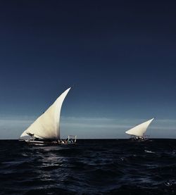 Sailboat sailing in sea