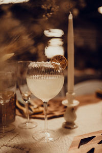 Close-up of wineglass on table