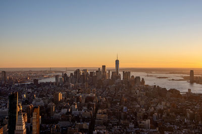 High angle view of city at sunset