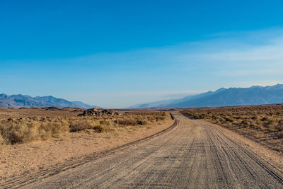 Desert dirt road owns valley california usa