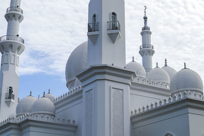 Corner of a mosque in indonesia with a white color and a unique architectural design