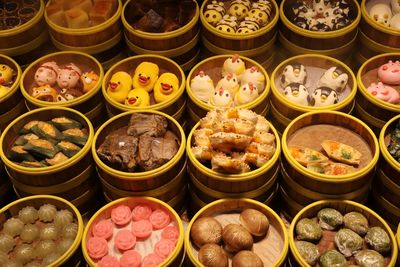 Colourful chinese steamed buns at the street food market in beijing, china