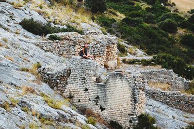 View of people on remains of a roman aqueduct