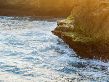 Waves splashing on rocks