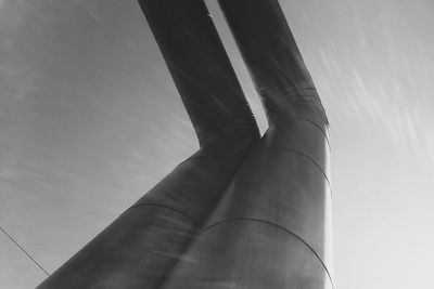 Low angle view of hand against sky