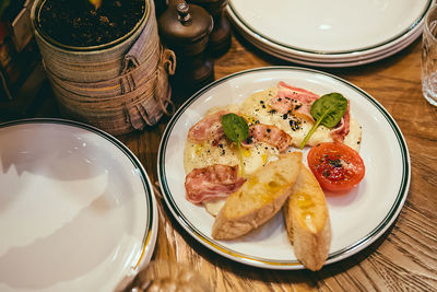 High angle view of breakfast served on table