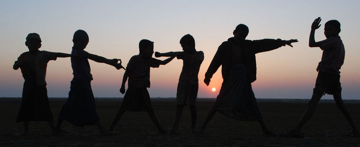 Silhouette of man at sunset