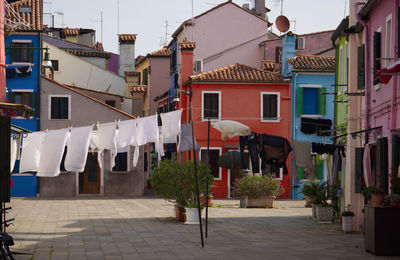 Rear view of people walking on street