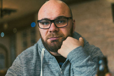 Portrait of man wearing eyeglasses