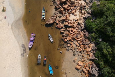 Boats moored at beach