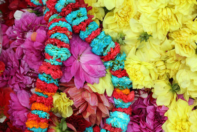 Full frame of multi colored flower garlands