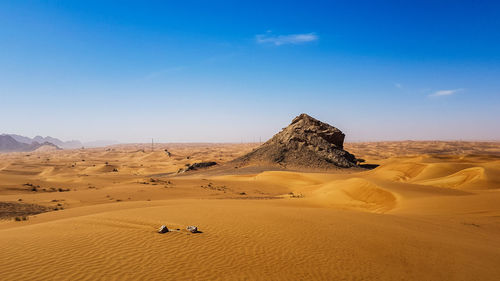 Scenic view of desert against sky