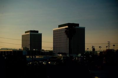 View of buildings at sunset