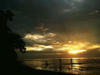 Scenic view of sea at sunset