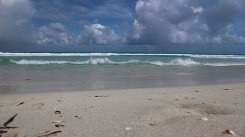 Scenic view of beach against sky