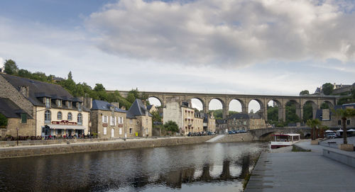 The port of dinan, brittany, france, with the viaduct and bridge crossing the river rance
