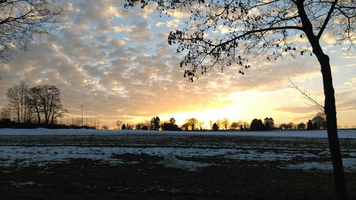 Scenic view of dramatic sky during sunset