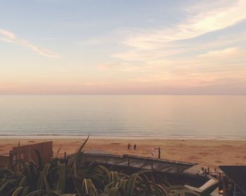 Scenic view of sea against sky at sunset