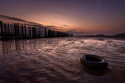 Scenic view of sea against sky at sunset