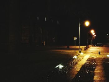 Illuminated street light at night