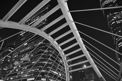 Low angle view of illuminated building against sky at night