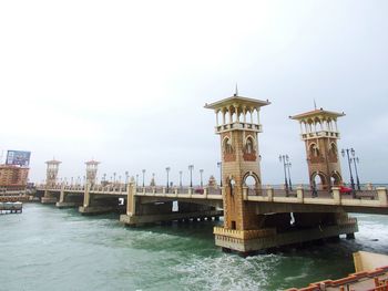 View of bridge over river against sky