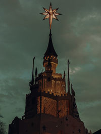 Low angle view of building against sky at dusk