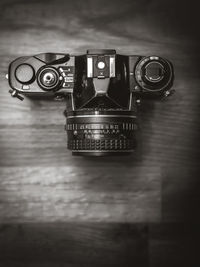 Close-up of camera on table