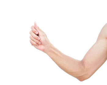 Close-up of hand against white background