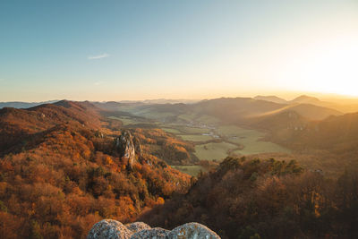 Sunset over autumn colourful forests surrounding sulovske rocks in slovakia, eastern europe