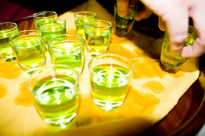 Close-up of beer glasses on table