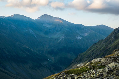 Scenic view of rocky mountains against sky, fagaras mountains, romania