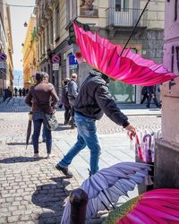 People walking on city street