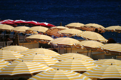 High angle view of parasols at beach