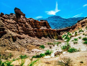 Scenic view of rock formations against sky