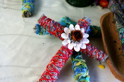 High angle view of multi colored flower on table