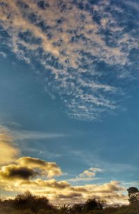 Low angle view of dramatic sky during sunset