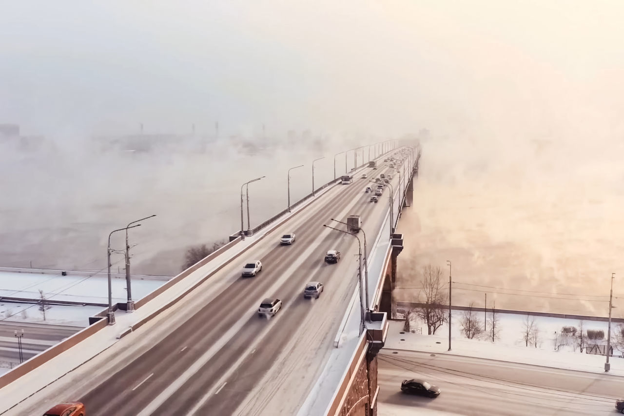 HIGH ANGLE VIEW OF BRIDGE IN WINTER