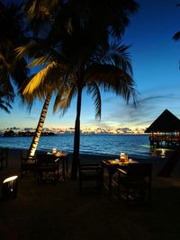 Scenic view of beach against sky during sunset
