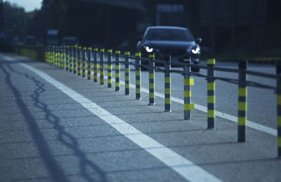 Bollards on road in city