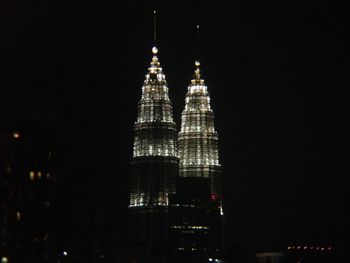 Low angle view of illuminated building at night