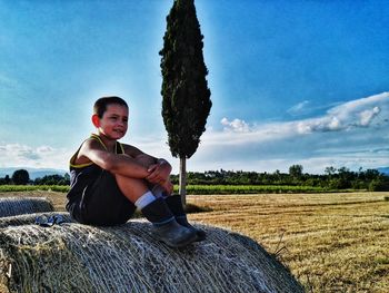 Man sitting in field