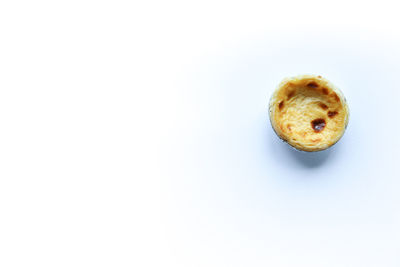 High angle view of bread on white background